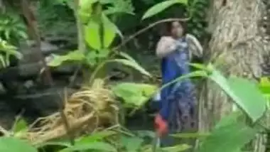 Village Lady Taking Bath Near River