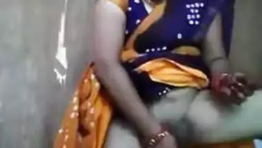 Innocent looking aunty playing with cucumber