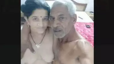 Indian old man with a young girl