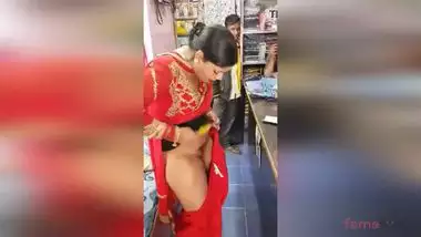 Lewd Desi aunty flashes her hairy pussy in the shop