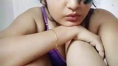 Pretty brunette spreads legs wide to XXX finger her wet Desi cunt