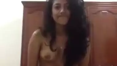 Enticing Desi babe sneaks in bathroom to record nice solo XXX video