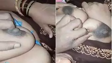 Young man touches XXX tits of Indian woman hiding behind the camera