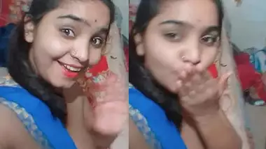 Indian teen with exposed tits poses on camera dreaming about porn