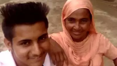 Boy and Desi MILF smile on camera thinking about upcoming porn video