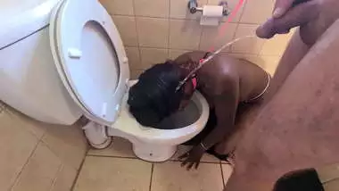 Desi whore gets walked like a dog to the toilet to get her face pissed on and sucks cock