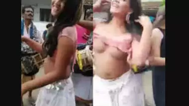 two whore nude dance in village, public place, infront of people