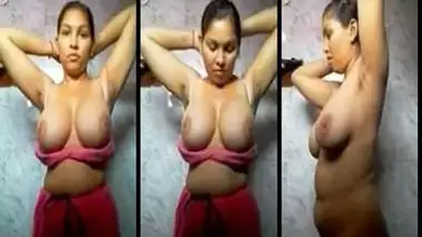 Huge tits Desi girl stripping her clothes in the bathroom